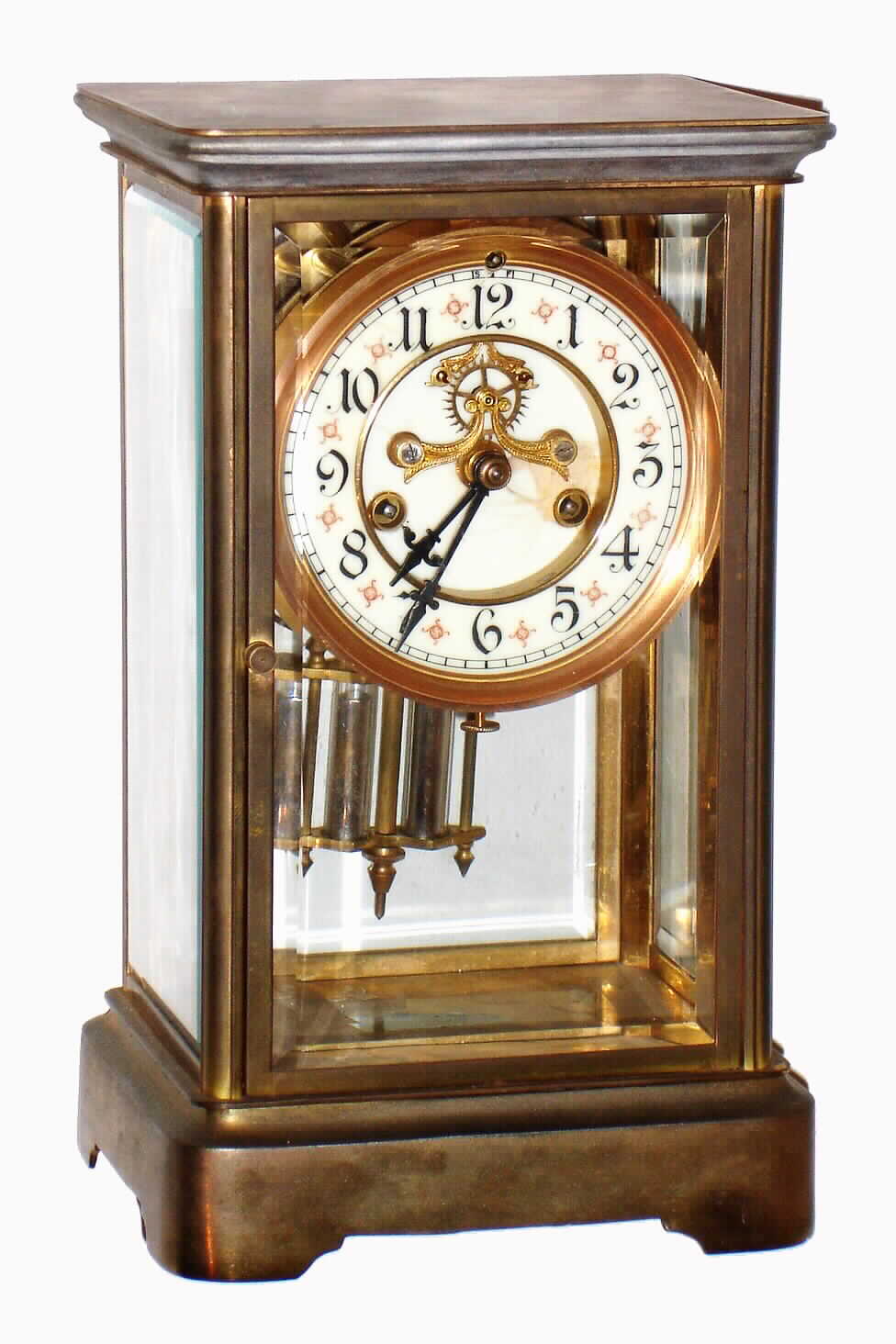 Waterbury Clock Co., Waterbury, Conn., "Toulon" brass and beveled glass 8 day, time and strike crystal regulator with exposed escapement, c1909 — Antique Clocks Price Guide