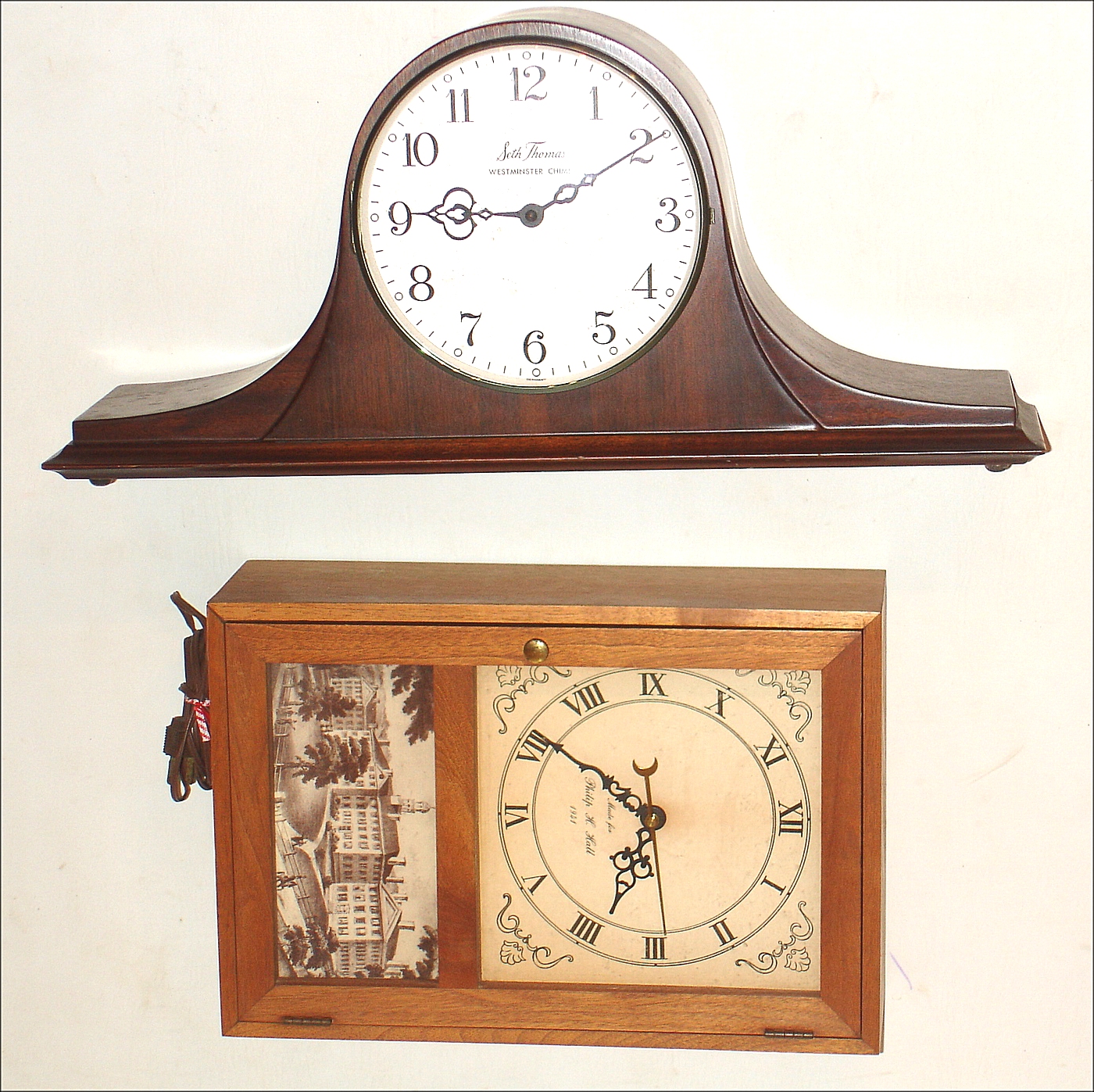 Clocks- 2 (Two) plug-in electrics: Seth Thomas Westminster Chime, 1965; Eli Terry reproduction box clock showing Dartmouth college, made in 1941 for Philip H. Hall. — Antique Clocks Price Guide