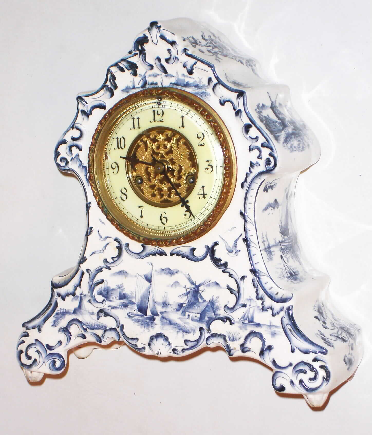Waterbury Clock Co., Waterbury, Conn., "Parlor No.?" 8 day, time and strike porcelain mantel clock, c1900 — Antique Clocks Price Guide