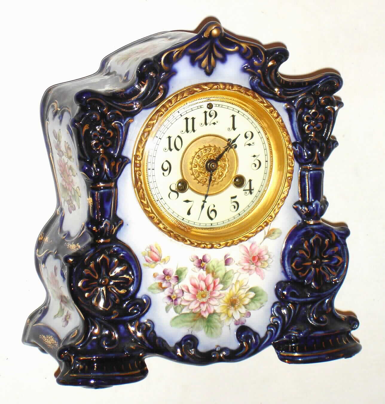 Waterbury Clock Co., Waterbury, Conn., "No. 95" 8 day, time and strike porcelain mantel clock, c1900 — Antique Clocks Price Guide