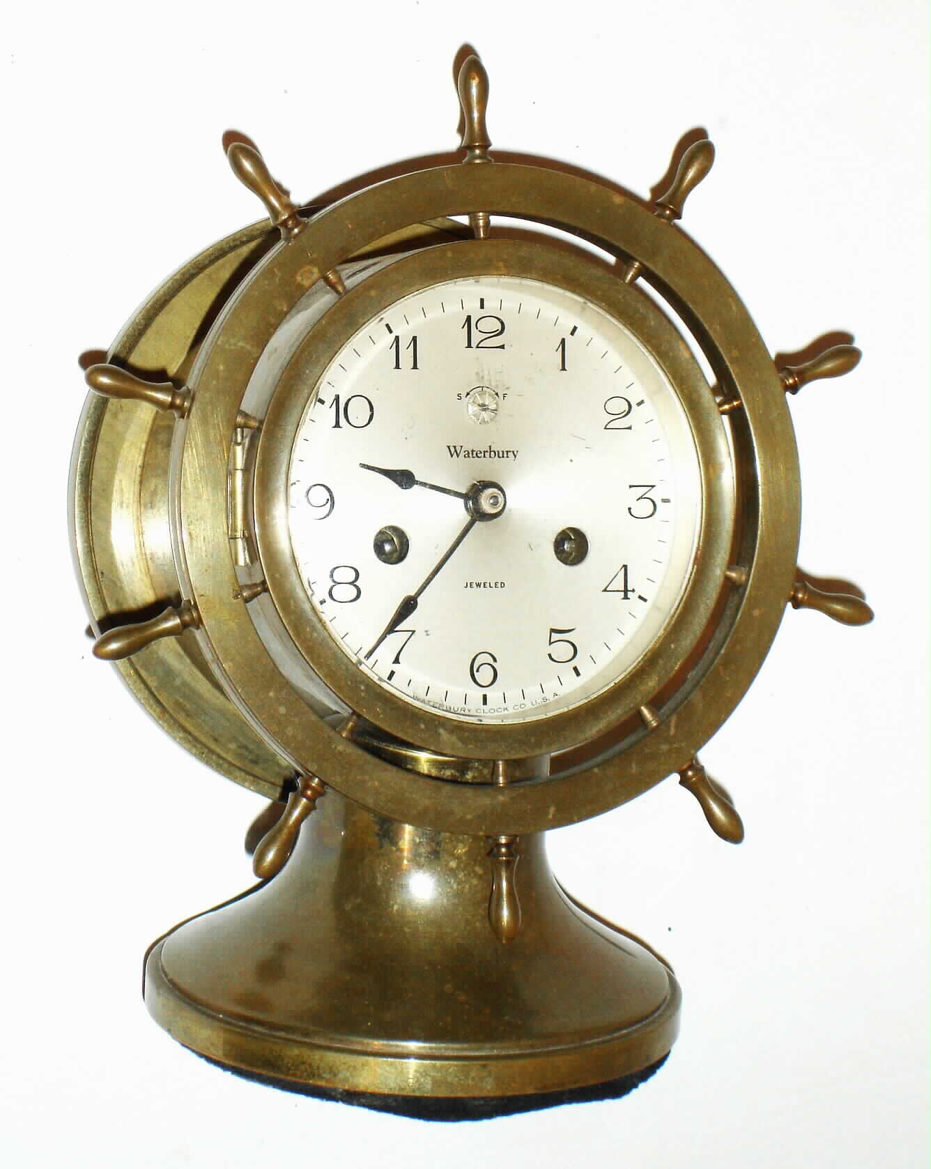 Waterbury Clock Co., Waterbury, Conn., "Ship's Bell No. 20" brass 8 day, time and strike marine clock, c1929 — Antique Clocks Price Guide