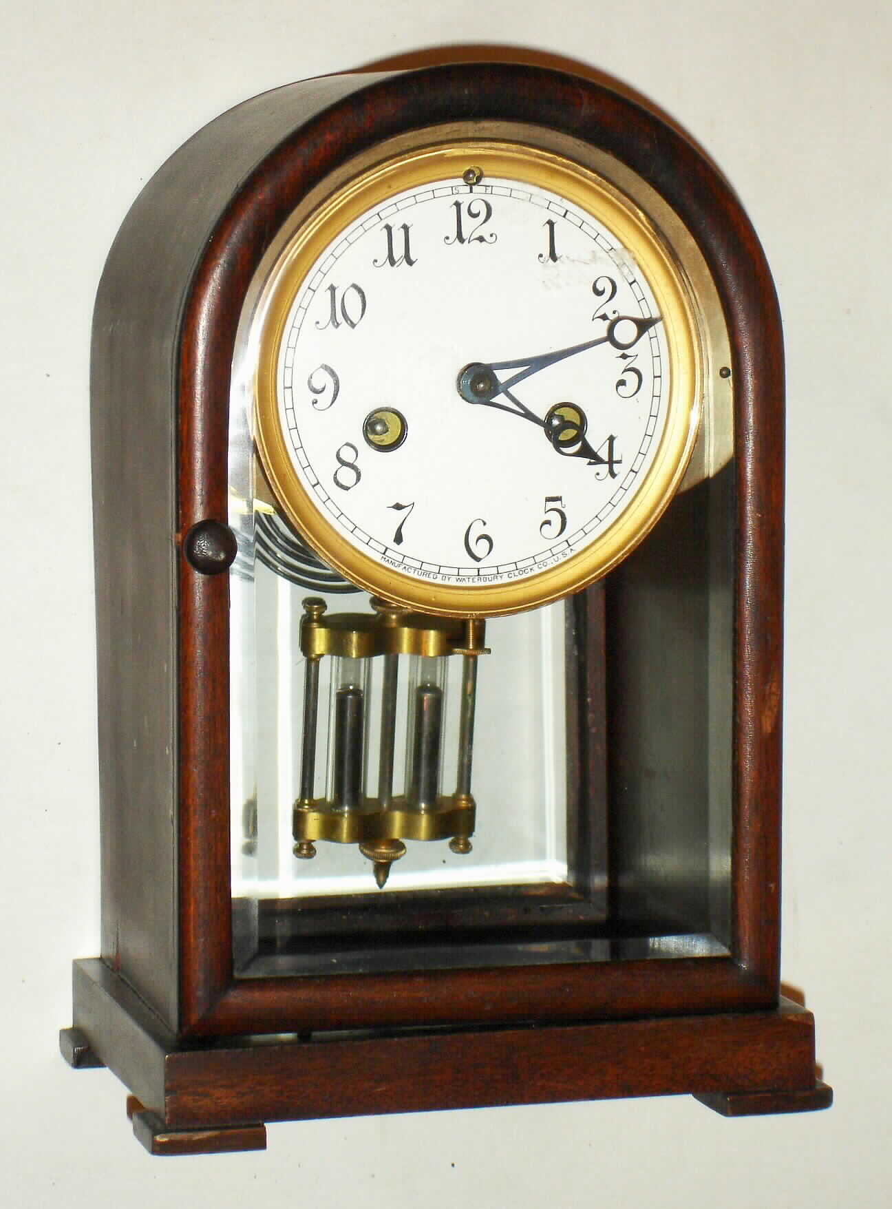 Waterbury Clock Co., Waterbury, Conn., "Marson" mahogany and beveled glass 8 day, time and strike crystal regulator, c1917 — Antique Clocks Price Guide