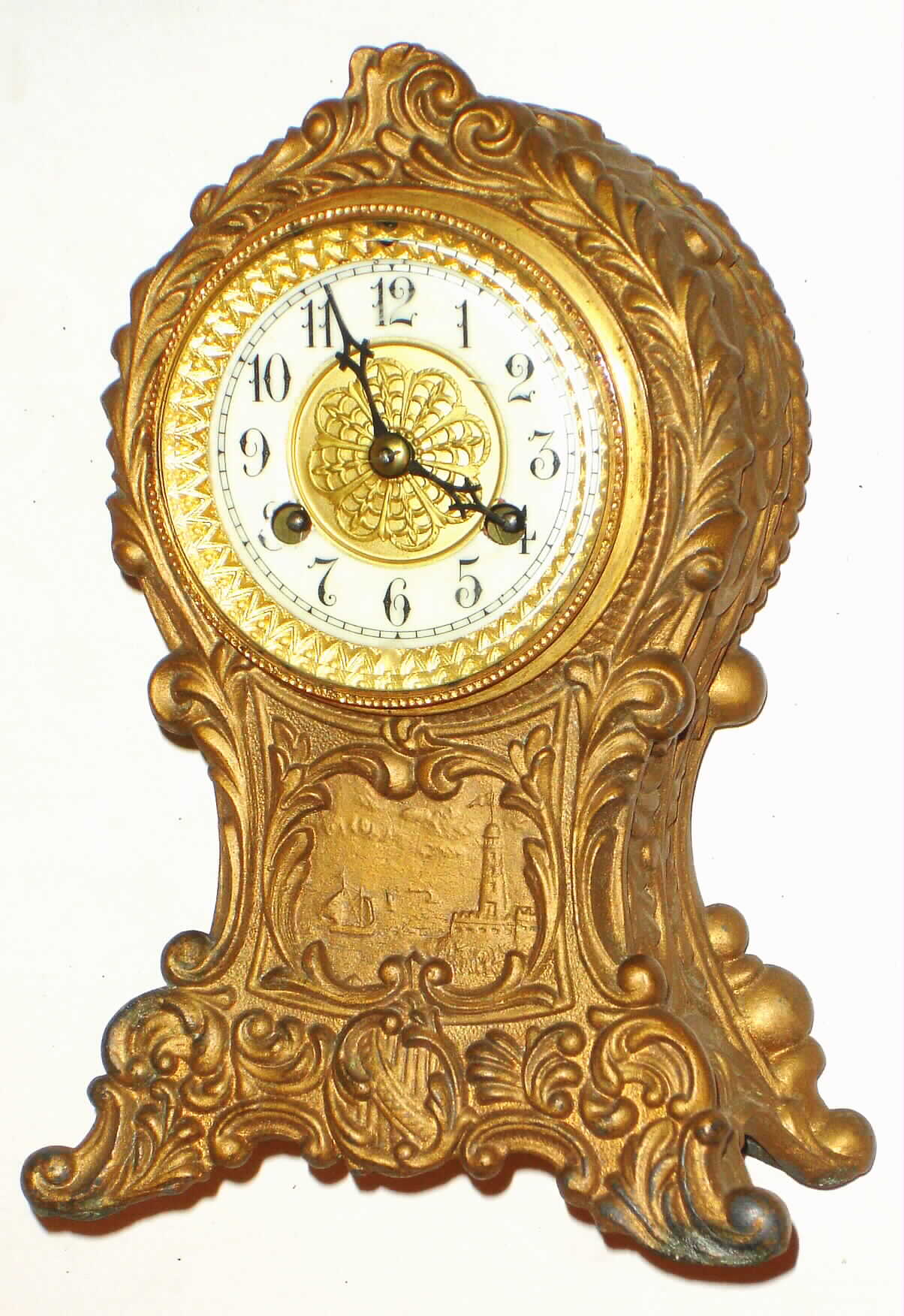 Waterbury Clock Co., Waterbury, Conn., "Verona" cast metal 8 day, time and strike small mantel clock, c1910 — Antique Clocks Price Guide