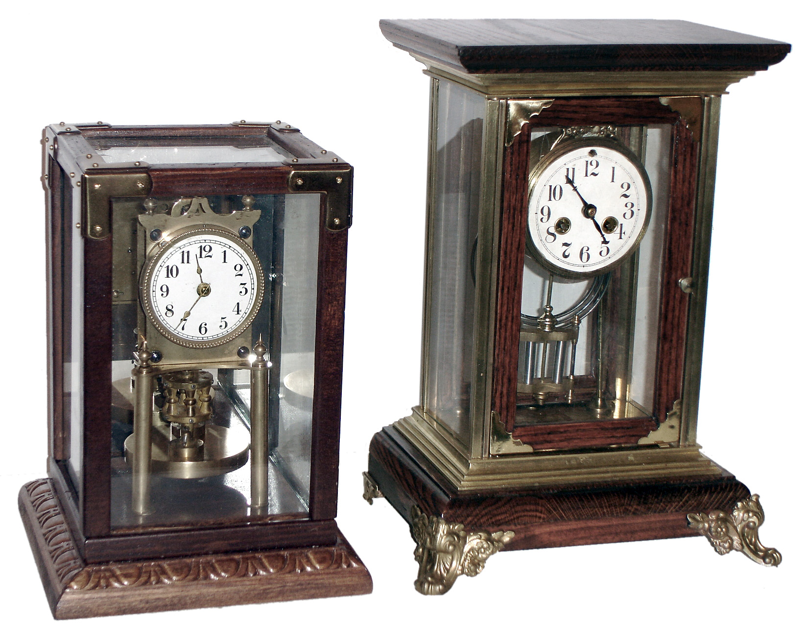 Clocks- 2 (Two) brass, glass and wood crystal regulators: French 8 day, time and strike; German 400-day; 20th century. — Antique Clocks Price Guide