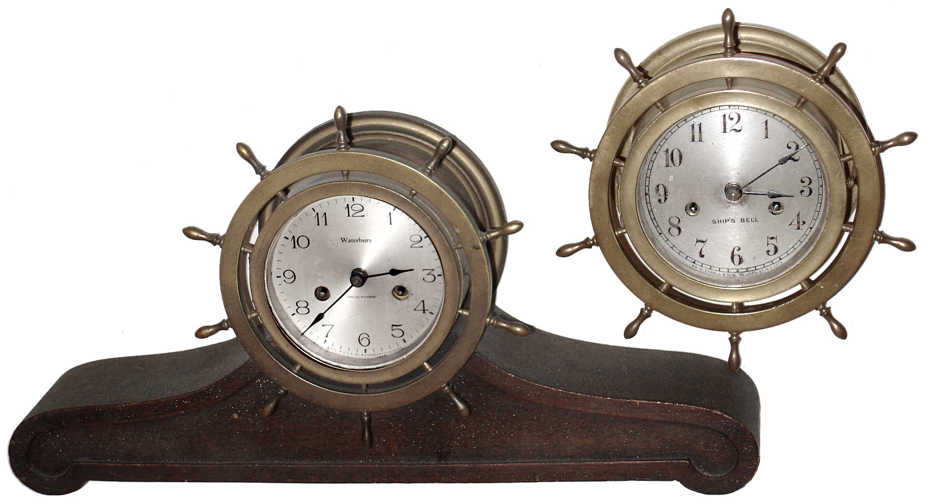 Clocks- 2 (Two) Waterbury Clock Co. brass 8 day ship's bells clocks: No. 10; and No. 15 on mahogany base, c1925 — Antique Clocks Price Guide