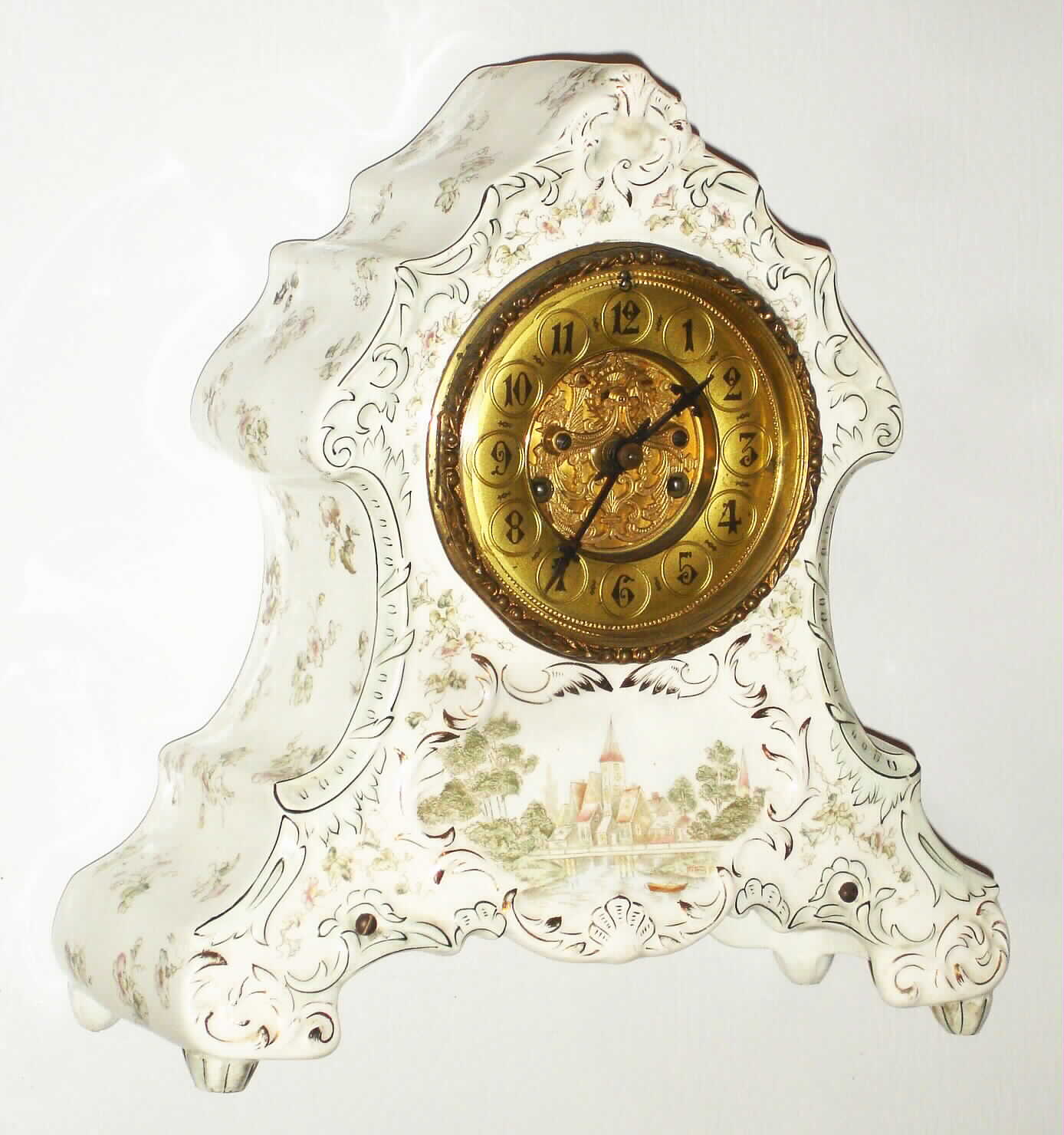 Waterbury Clock Co., Waterbury, Conn., "Parlor No. 18" 8 day, time and strike porcelain mantel clock, c1900 — Antique Clocks Price Guide