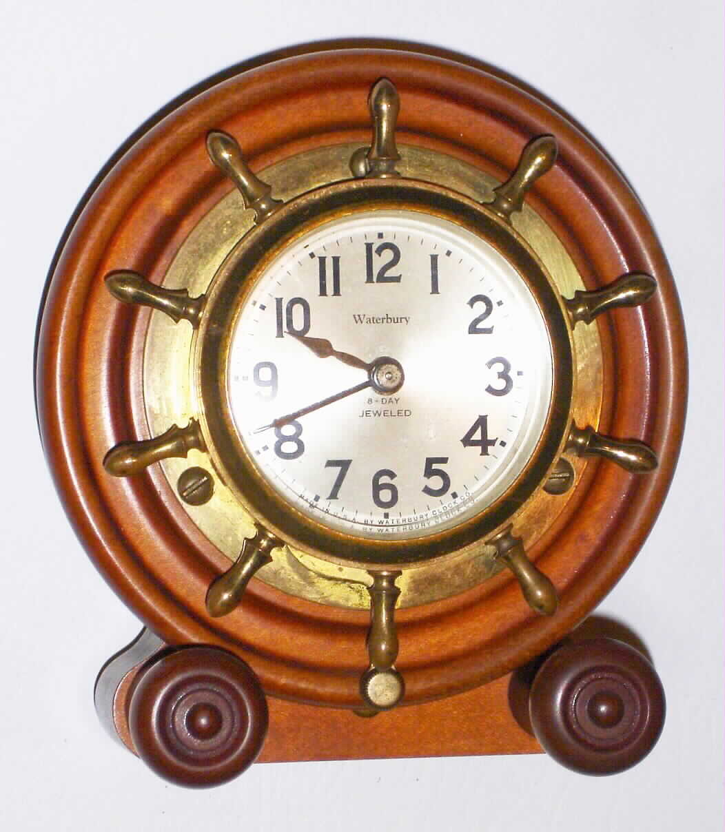 Waterbury Clock Co., Waterbury, Conn., "Motor Boat No. 1" brass 8 day marine time piece mounted in unique wood case, c1929 — Antique Clocks Price Guide