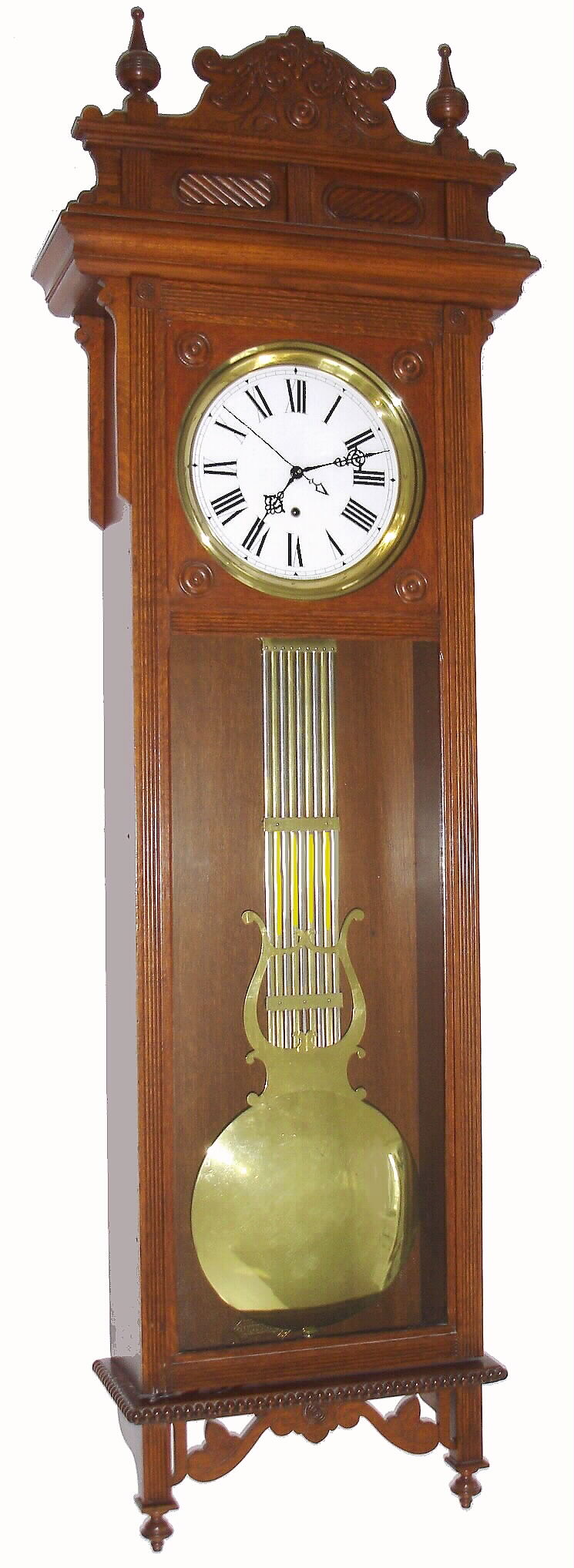 Waterbury Clock Co., Waterbury, Conn., "REGULATOR No. 60", oak cased ,jeweler's time piece, with wide rod gridiron pendulum, porcelain dial and center seconds hand, c1903 — Antique Clocks Price Guide