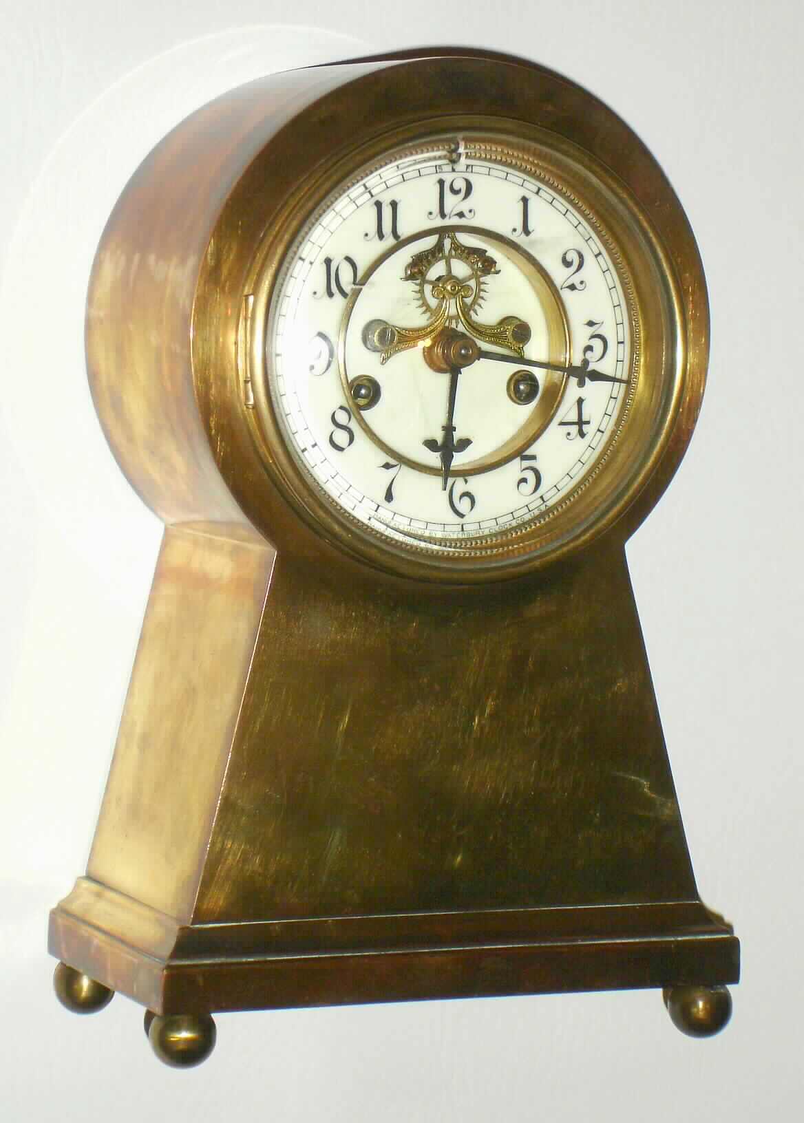 Waterbury Clock Co., Waterbury, Conn., "Monaco" brass 8 day, time and strike mantel clock, c1910 — Antique Clocks Price Guide