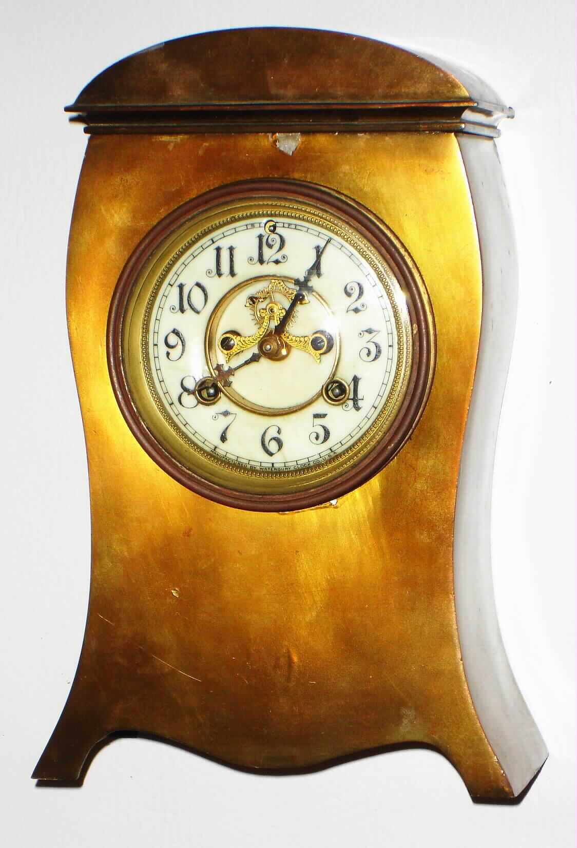 Waterbury Clock Co., Waterbury, Conn., "Lyons" brass 8 day, time and strike mantel clock, c1912 — Antique Clocks Price Guide