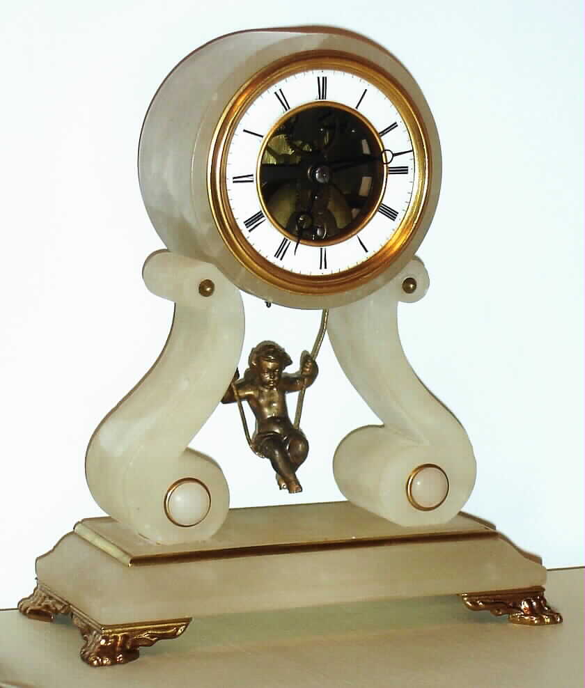 French, 8 day swinging doll in a white alabaster case, c1890 — Antique Clocks Price Guide
