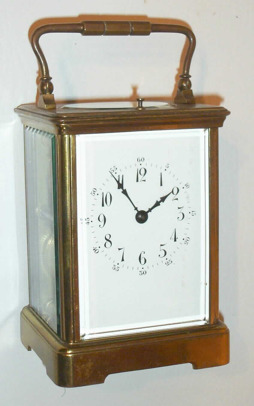 French, 8 day, time, strike and repeat brass cased carriage clock in a corniche case, c1900. — Antique Clocks Price Guide