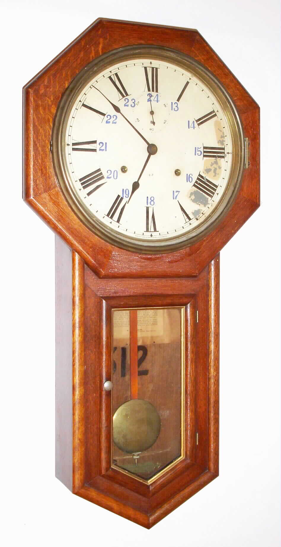 Seth Thomas Clock Co., Thomaston, Conn., "World", 15-day double spring time only movement stamped "40" in oak case with gold leaf molding around door glass and painted metal dial, c1913 — Antique Clocks Price Guide