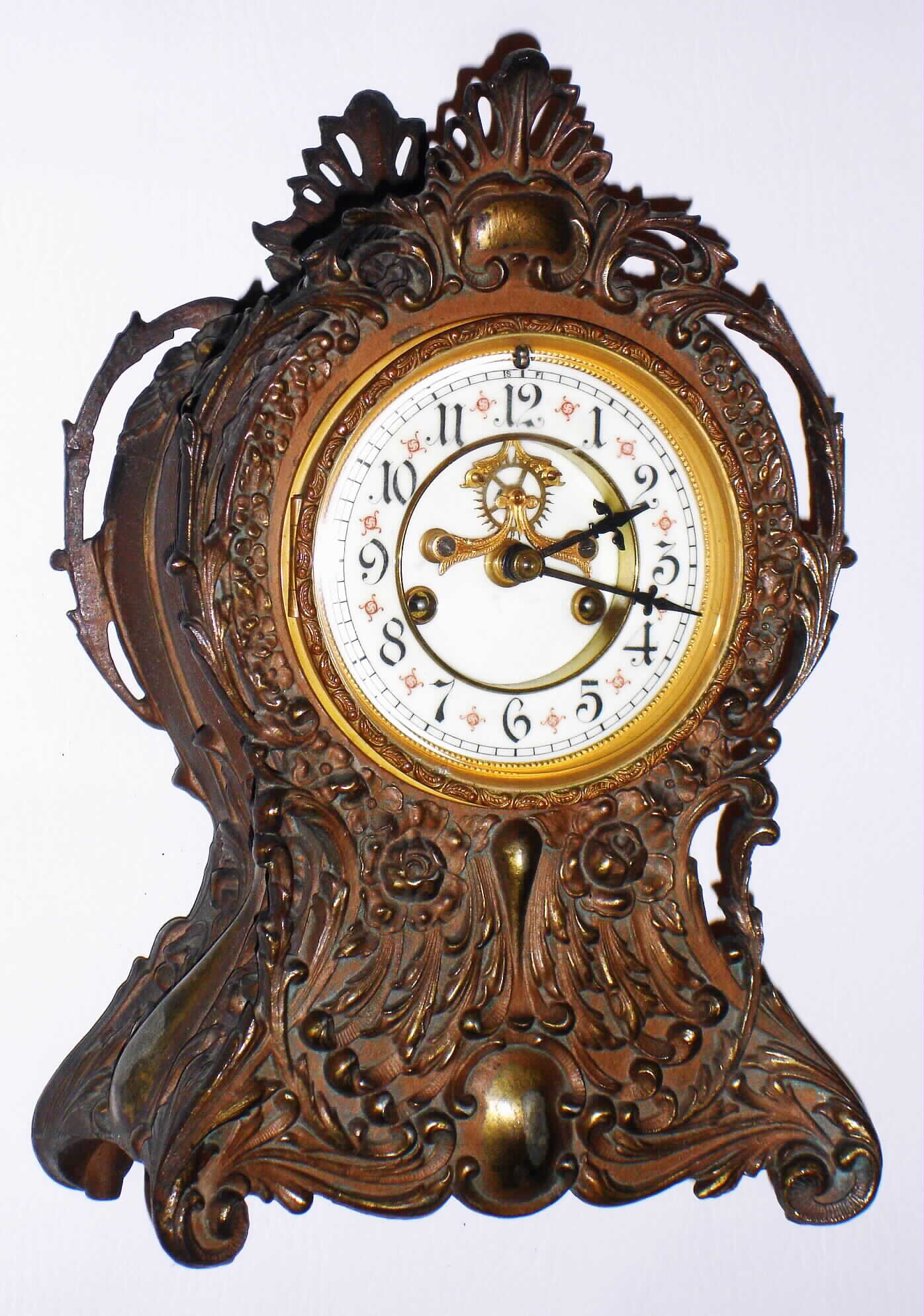 Waterbury Clock Co., Waterbury, Conn., cast metal 8 day, time and strike mantel clock, c1906 — Antique Clocks Price Guide