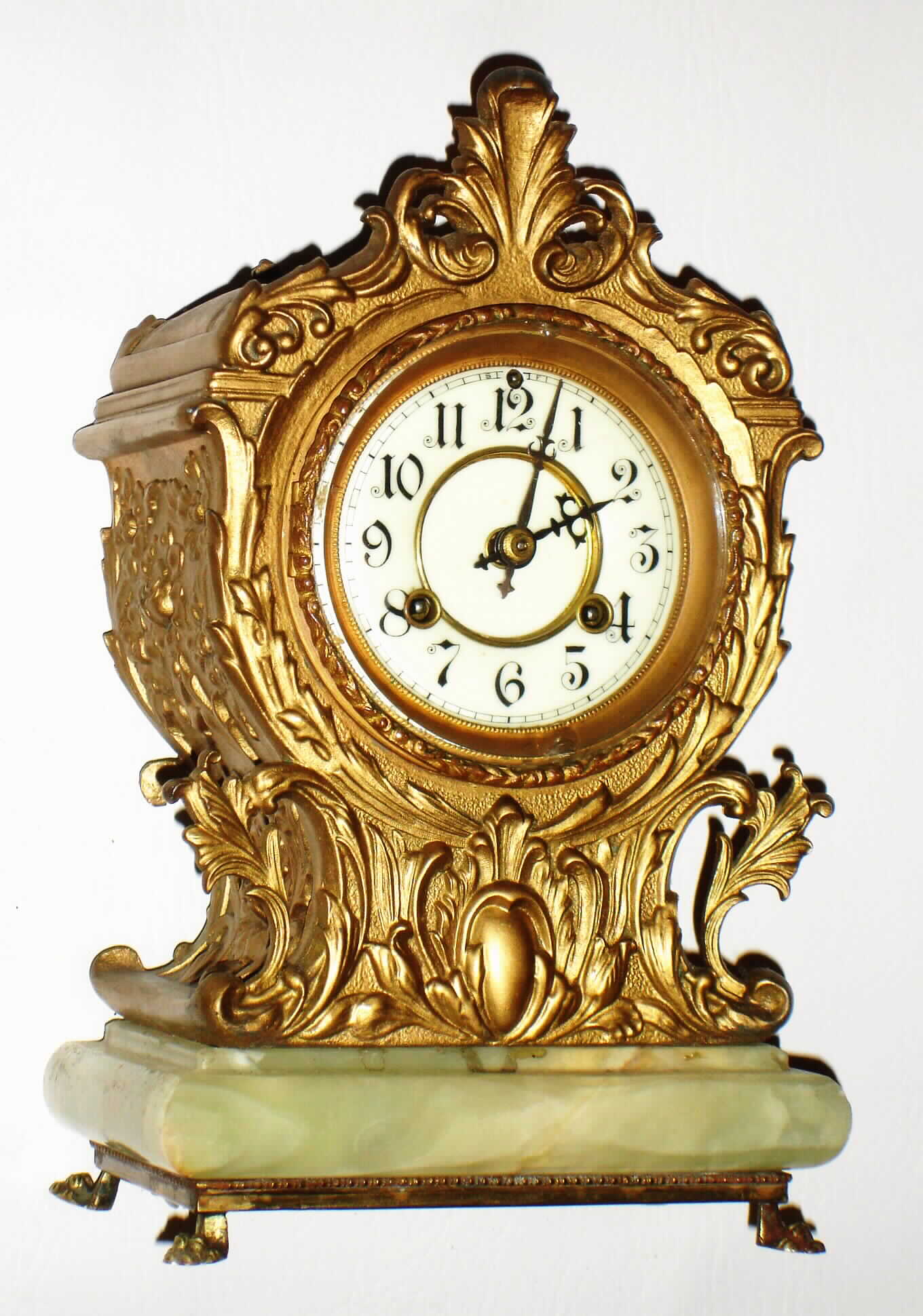 Waterbury Clock Co., Waterbury, Conn., cast metal and onyx 8 day, time and strike mantel clock, c1900 — Antique Clocks Price Guide