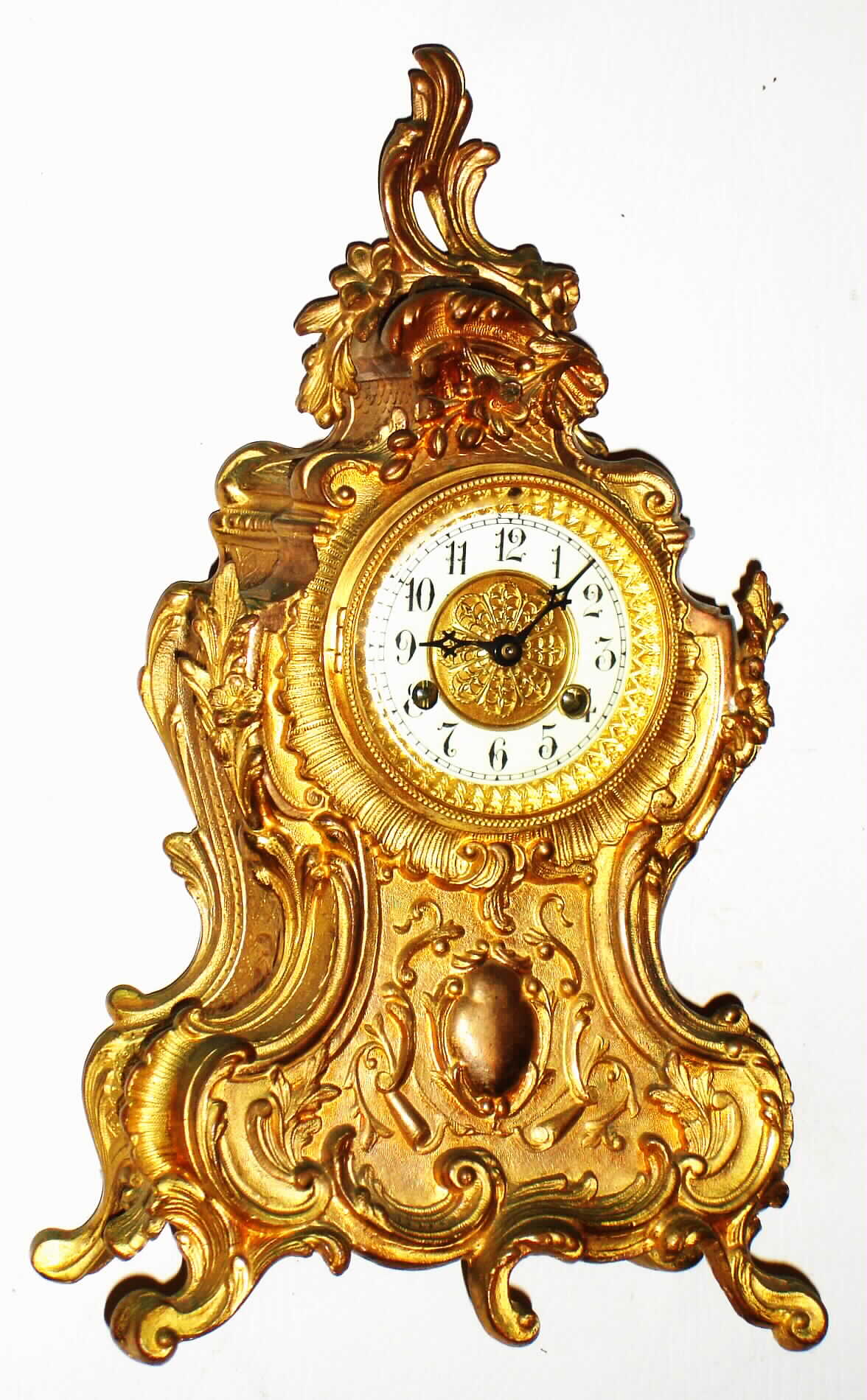 Waterbury Clock Co., Waterbury, Conn., gold plated cast metal, 8 day, time and strike mantel clock, c1906 — Antique Clocks Price Guide