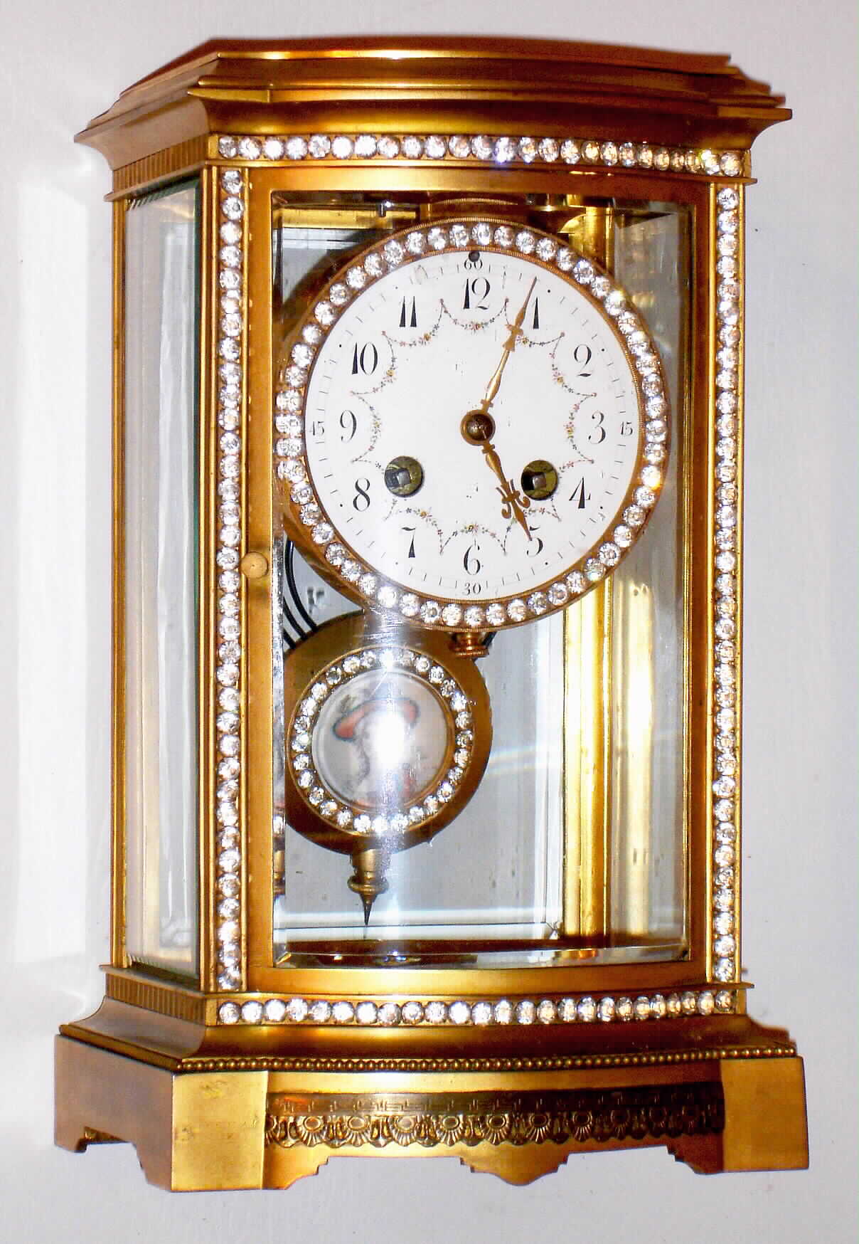 French brass and glass 8 day, time and strike bow-front rhinestone crystal regulator, c1890 — Antique Clocks Price Guide