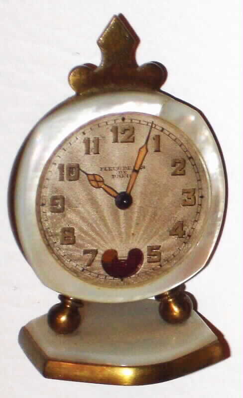 Fleus de Lys de Paris Swiss 30 hour miniature alabaster and brass beating heart time piece with original case, c1920 — Antique Clocks Price Guide