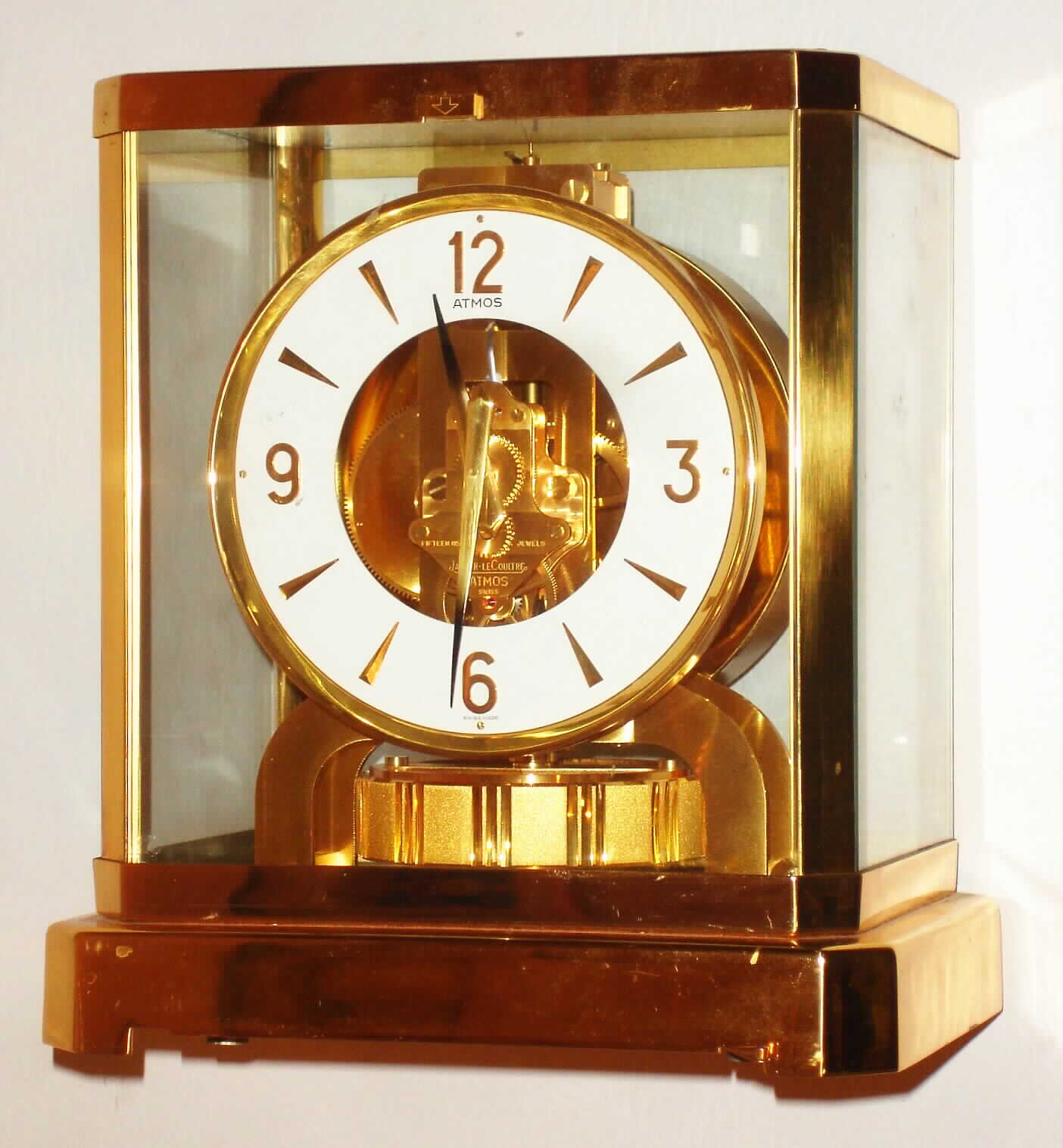 LeCoultre Swiss "Atmos" gold plate and glass perpetual mantel clock, c1979 — Antique Clocks Price Guide