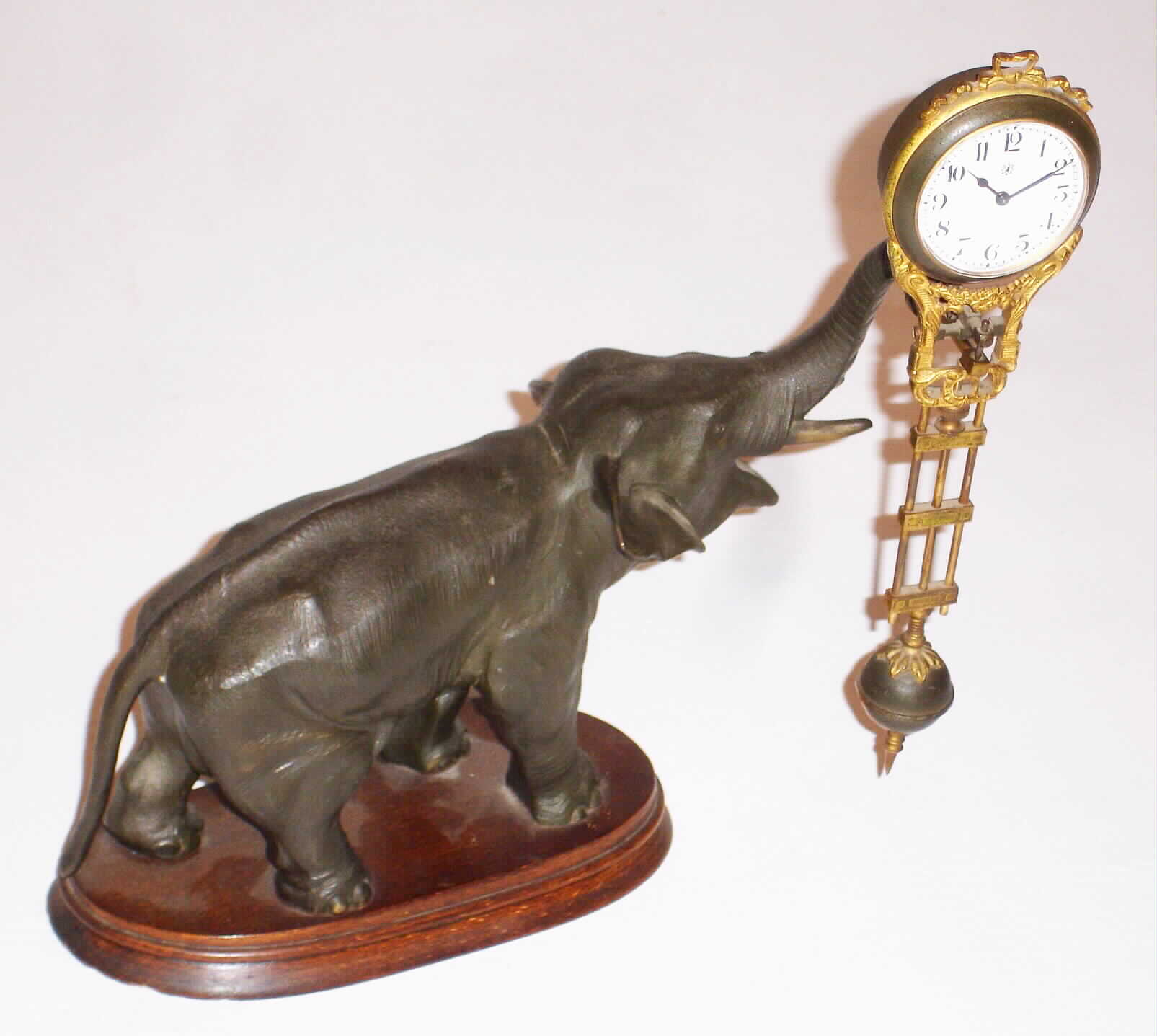 Junghans, Germany, 8 day elephant swing time piece, c1910 — Antique Clocks Price Guide