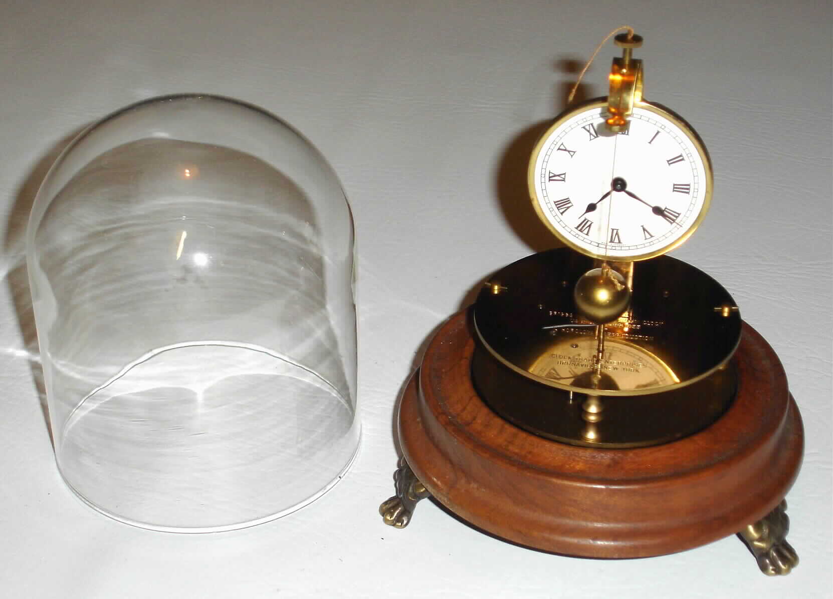 Clock Trade Enterprises Bronxville, N.Y., Horolovar German reproduction of 1855 Briggs rotary clock, c1980. — Antique Clocks Price Guide