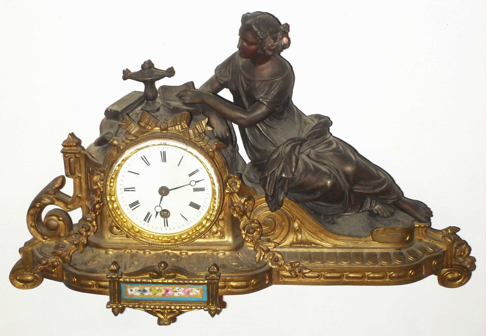 French cast brass and spelter 8 day figural mantel time piece, c1840 — Antique Clocks Price Guide
