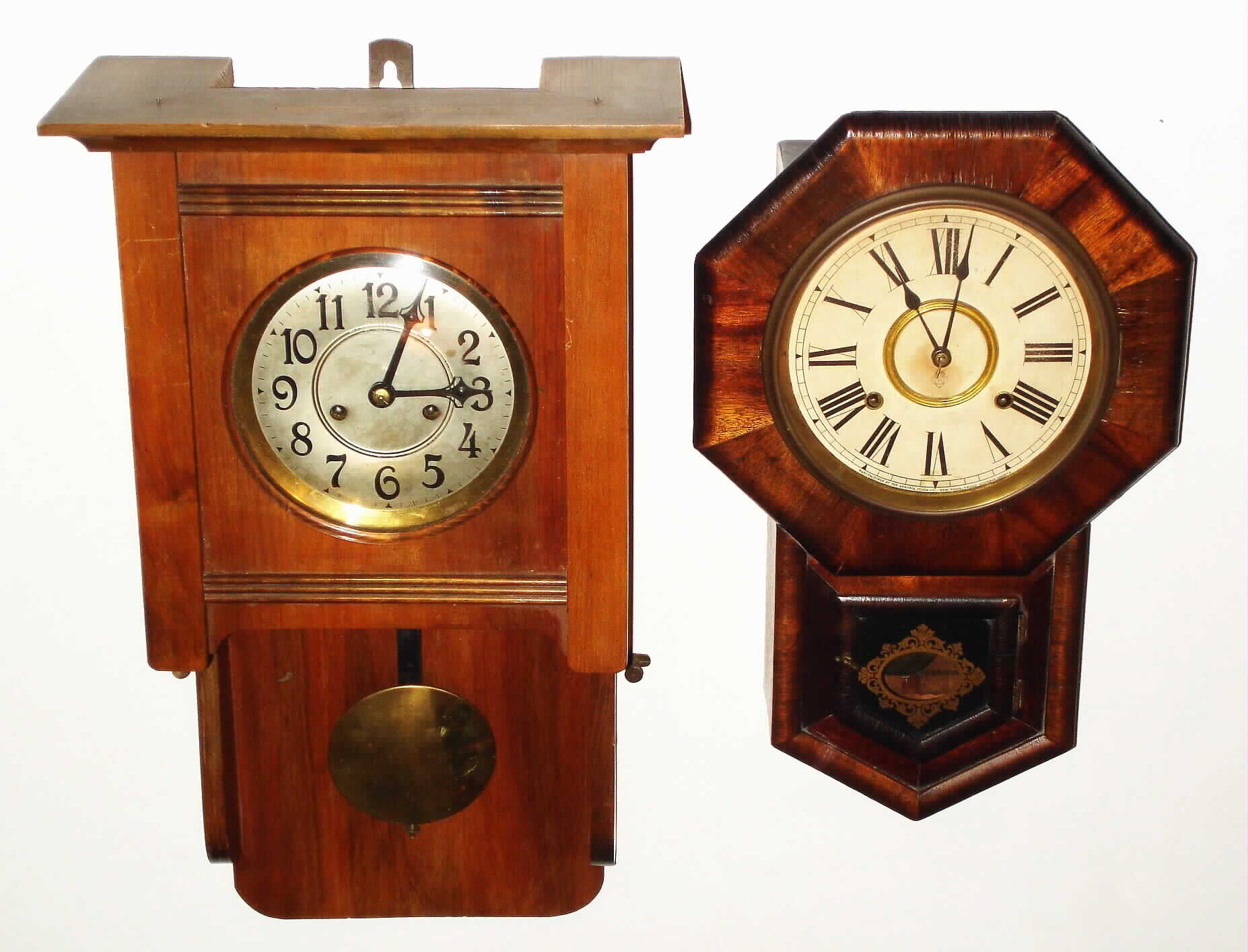 Clocks- 2 (Two) wood 8 day, time and strike wall clocks: Ansonia drop octagon; German Berliner open well: early 20th century — Antique Clocks Price Guide
