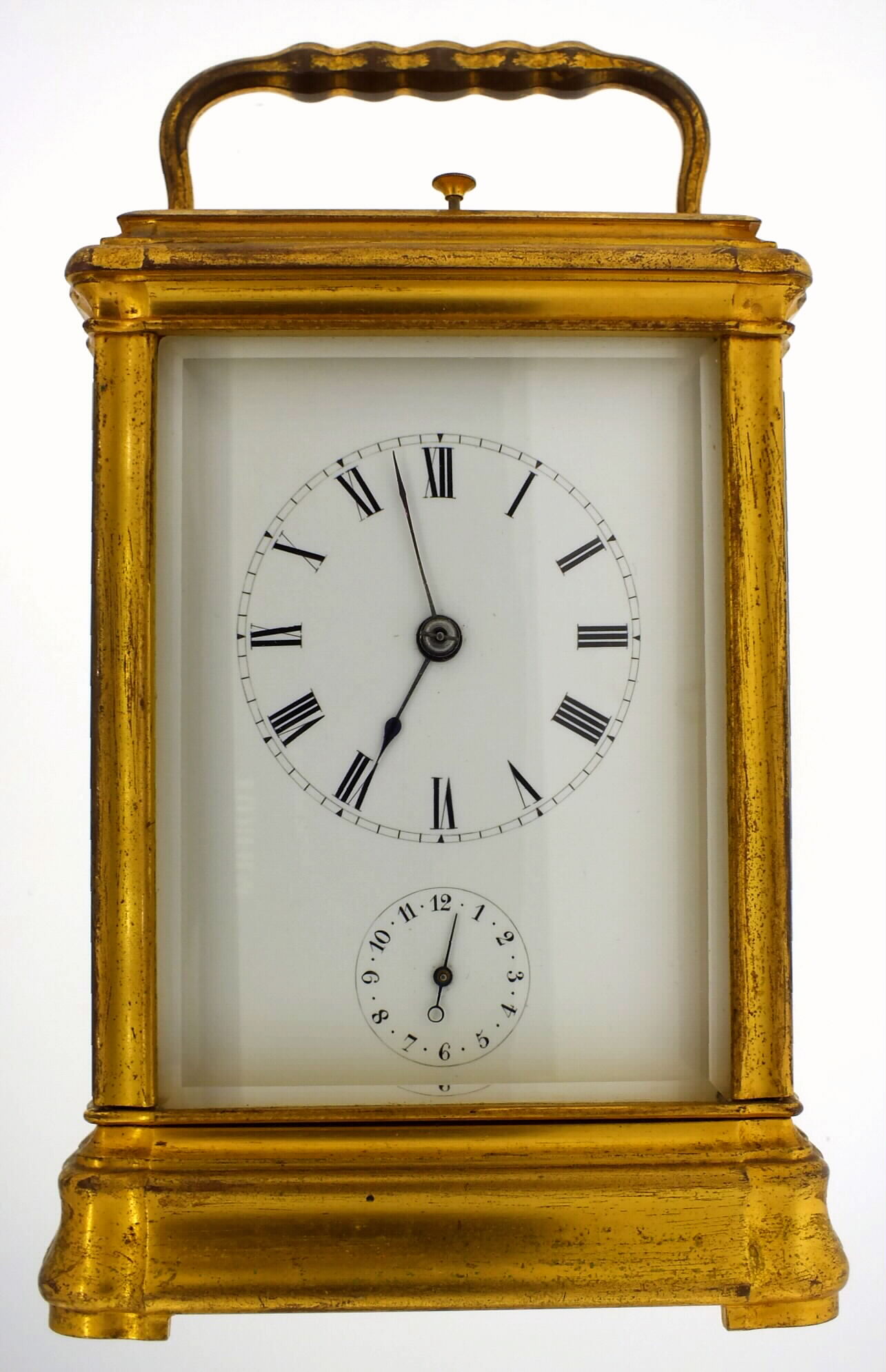 Patay, Paris, French grand sonnerie repeating carriage clock in gilt Gorge case, spring powered eight day movement with time, strike and alarm, sounding the hours and ting tang quarters on two bells, silvered lever platform escapement, strike select lever on back plate, signed Patay Paris, gilt Gorge case with beveled glass front sides and top, the back with a solid door and shutter to allow access for winding and setting without opening, vented base for greater strike volume, white enamel dial with Roman numeral dial, and Arabic alarm, blued steel hands, c1870 — Antique Clocks Price Guide