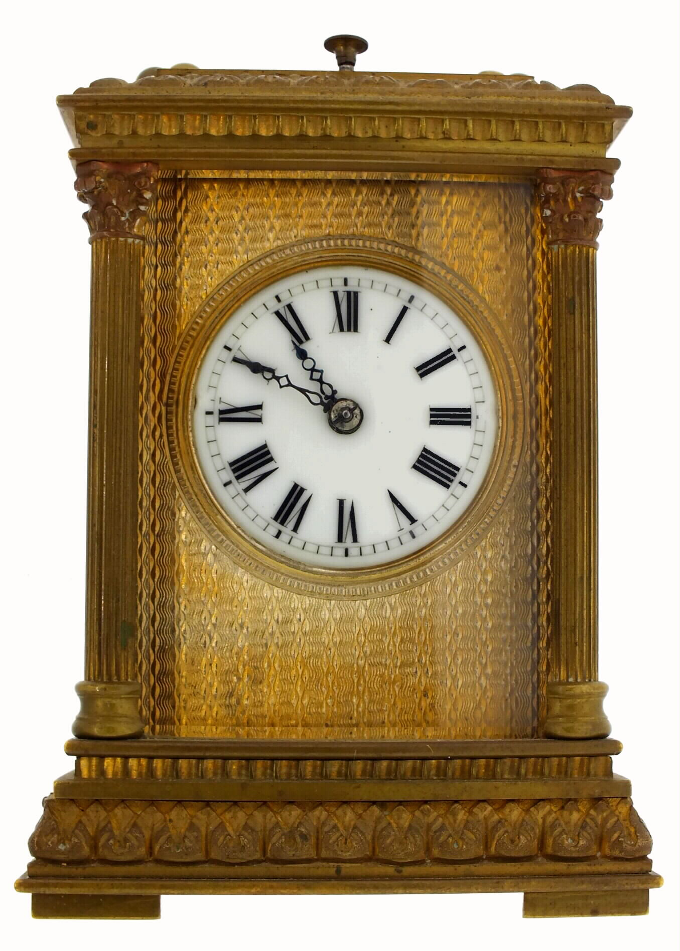 French carriage clock with petite sonnerie striking on gongs, spring powered eight day time only movement with silvered lever platform, in an ornamented Anglaise style brass case, with beveled glasses, case with Corinthian columns and foliate border top and base, straight line guilloche gilt dial mat, with white enamel Roman numeral dial, blued steel hands.     c1890 — Antique Clocks Price Guide