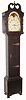 American tall clock, unsigned, 8 day with rolling moon, the last repair label from 1883, Philadelphia. Movement with well shaped plates along the top and cut out at bottom to conserve brass. The informal country case of mixed woods retains large cast door hinges and a deep broken arch, c1825