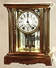 Seth Thomas Clock Co., Thomaston, Conn., "Empire No. 64" crystal regulator, 8 day, time and strike spring driven movement, polished brass and glass case, c1908