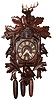 German Black Forest cuckoo and quail carved wood wall clock, c1900