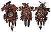 Clocks- 3 (Three) modern carved wood 30 hour cuckoos, two are 3-weight, late 20th century.