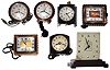 Clocks- 7 (Seven) Deco GE electric desk models in Bakelite, metal and glass cases, c1930