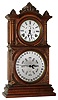 E. Ingraham Bristol, Conn., "Ingraham Calendar" walnut 8 day, time and strike double dial calendar clock, c1881