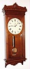 Seth Thomas Clock Co., Thomaston, Conn. "Regulator No. 30" wall clock, 8 day, time only, weight driven movement in a walnut case with painted metal dial and nickel plated pendulum bob and weight, c1880