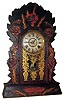 Wm. L. Gilbert, Winsted, Conn., "Progress 57" gingerbread mantel clock, 8 day, time and strike, spring driven movement in multicolor pressed wood Lily pattern case with papered dial, c1910