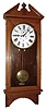 Waterbury Clock Co., Waterbury, Conn., "Regulator No. 18" wall clock, 8 day, time only, two weight driven movement in an oak case with painted metal dial, c1893