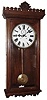 Waterbury Clock Co., Waterbury, Conn., "Regulator No. 18" wall clock, 8 day, time only, two weight driven movement in an oak case with painted metal dial, c1906