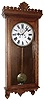 Waterbury Clock Co., Waterbury, Conn., "Regulator No. 18" wall clock, 8 day, time only, two weight driven movement in an oak case with painted metal dial, c1906