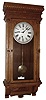 Waterbury Clock Co., Waterbury, Conn., "Leeds" wall clock, 8 day, time only, spring driven movement in an oak case with painted metal dial, c1890