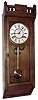 Waterbury Clock Co., Waterbury, Conn., "Stafford" wall clock, 8 day, time only, spring driven movement in an ash case with papered metal dial, c1890