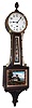 Waterbury Clock Co., Waterbury, Conn., "Willard No. 5" banjo wall clock, 8 day, time only, weight driven movement in mahogany case with gilt molding around reverse painted throat and lower tablets and white enamel dial and cast brass bezel, c1906