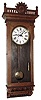 Waterbury Clock Co., Waterbury, Conn., "Regulator No. 53" wall clock, 8 day, time only, two weight driven movement in an oak case with painted metal dial, c1906
