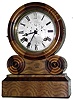 E. Ingraham, Bristol, Conn. "Grecian Mosaic" 8 day, time and strike walnut mantel clock, case front of walnut and ash, c1870