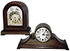 Clocks- 2 (Two) 8 day Westminster-chime mahogany mantel clocks, German Junghans and Waterbury, early 20th century.