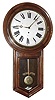 Waterbury Clock Co., Waterbury, Conn., "Admiral" wall clock, 8 day, time only, spring driven movement in a walnut case with painted metal dial, c1900