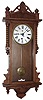 Waterbury Clock Co., Waterbury, Conn., "Elgin" wall clock, 8 day, time only, spring driven movement in an oak case with painted metal dial, c1900
