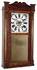 Clocks- 2 (Two) Daniel Pratt, Jr., Reading, Mass., 30 hour time, strike and alarm wooden works mahogany shelf clock, 1839; E. Ingraham "Ruby" walnut 8 day, time and strike gingerbread clock, 1902.