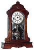 Waterbury Clock Co., Waterbury, Conn., "Lowell" walnut 30 hour time and strike mantel clock, c1881